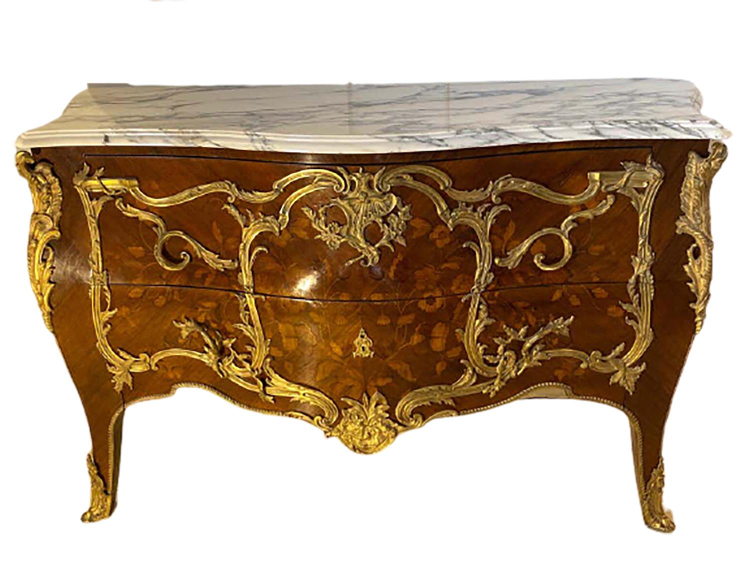 Pair of 19th century king and queen compatible marble-top commodes. Each having a white and grey serpentine marble top above two deep drawers decorated sans traverse and ormolu mounts atop slightly curved legs with bronze sabots. The King with
