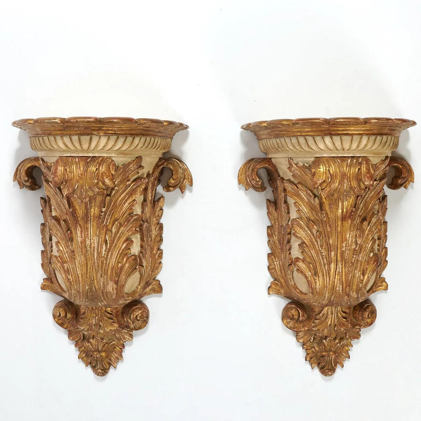 Pair of very large antique (19th century) hand-carved and gilded wooden brackets in the Baroque style measuring an impressive 24 by 16 by 12 1/2 inches.
