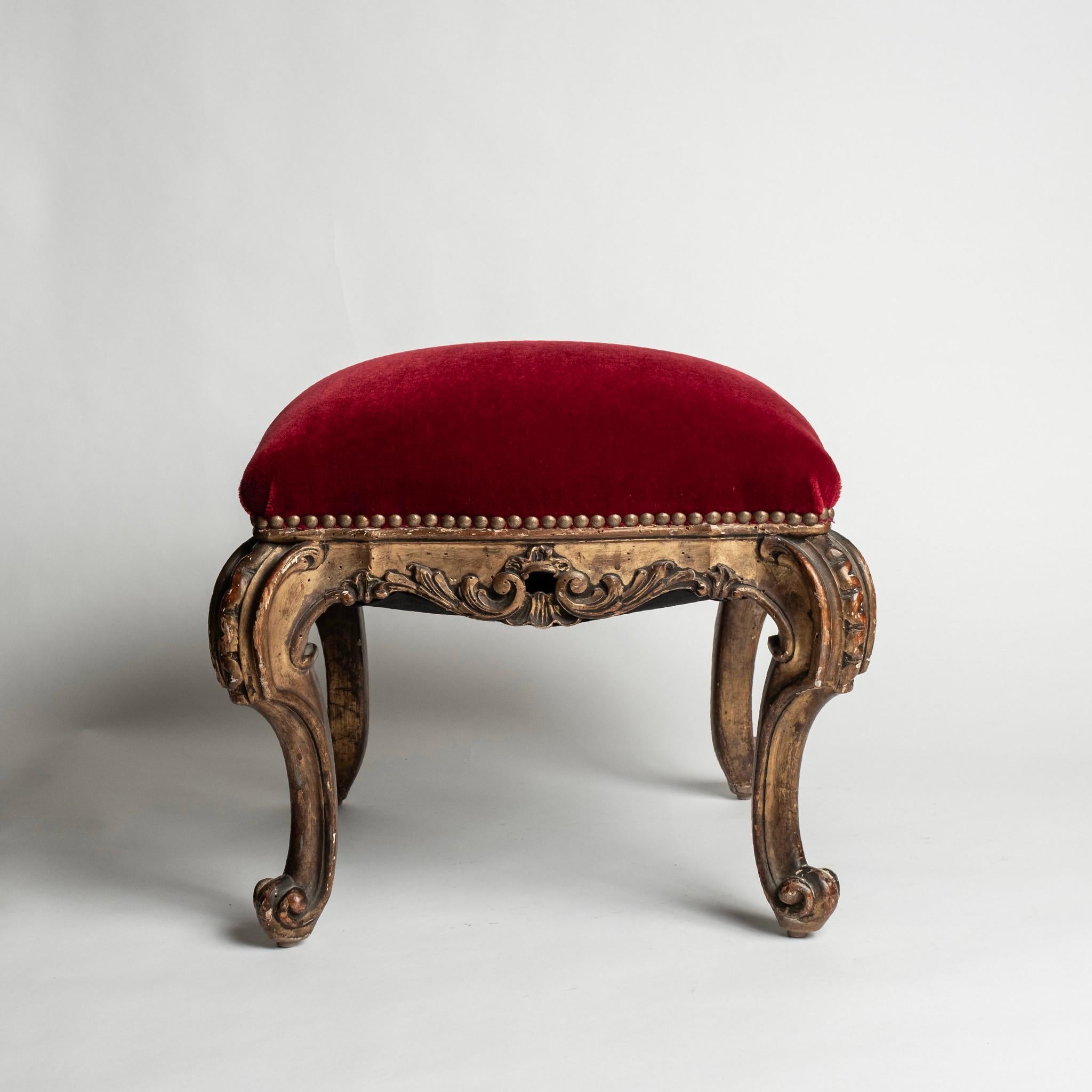 Pair of 19th-century Italian Louis XV style stools upholstered in a rouge red mohair.