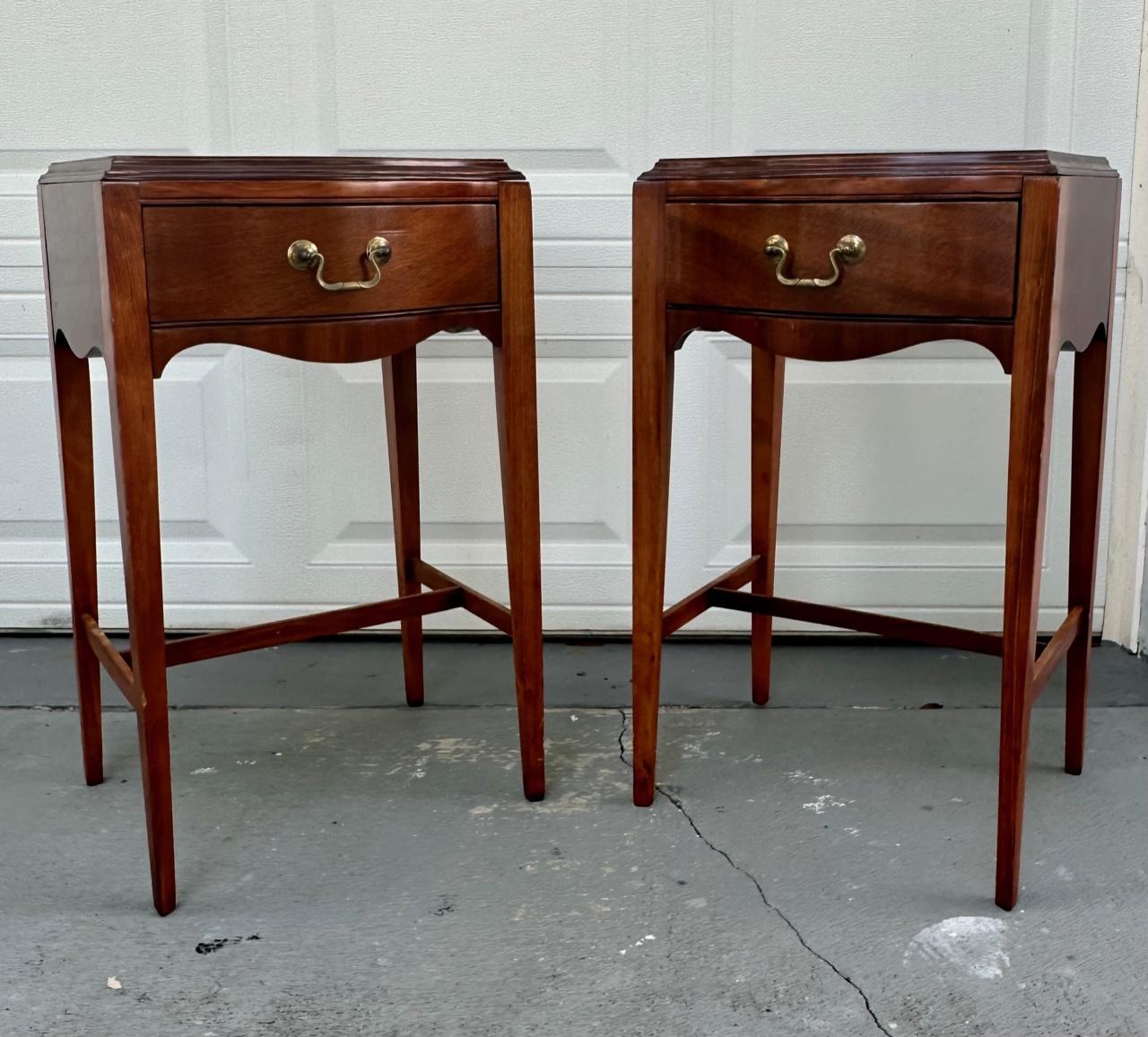 Pair 19th Century Louis XVI Style Mahogany Serpentine Nightstands.

These beautiful. petite 19th century mahogany nightstands have a serpentine top and a curved apron on front and sides.  One drawer opens with bronze handled hardware.  The bedside
