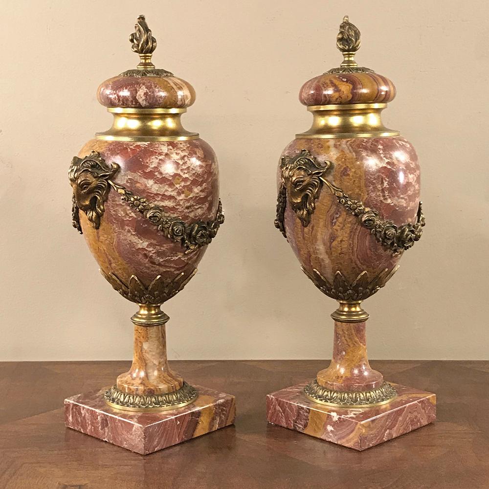 Pair of 19th century marble and bronze cassolettes ~ mantel urns were designed to add a layer of opulence to any room! Perfect for the fireplace mantel, atop consoles, buffets, or any surface, the richness of the deeply veined marble is enhanced by