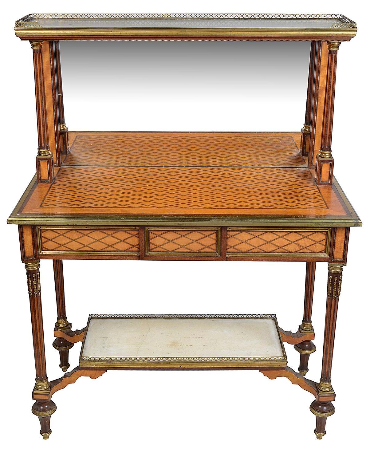 A fine quality pair of 19th Century Satinwood parquetry inlaid, marble topped side / console tables, with mirror backs, three quarter pierced brass gallery. wonderful parquetry inlay to the tops and frieze drawers. Supported on four ormolu mounted