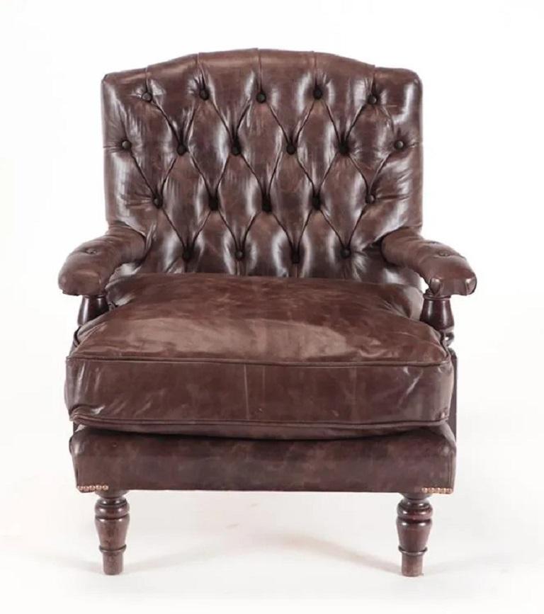 Pair of William IV Style Tufted Leather Armchairs. The chairs have a solid walnut frame and tufted leather upholstery. The chairs have a nice patina.