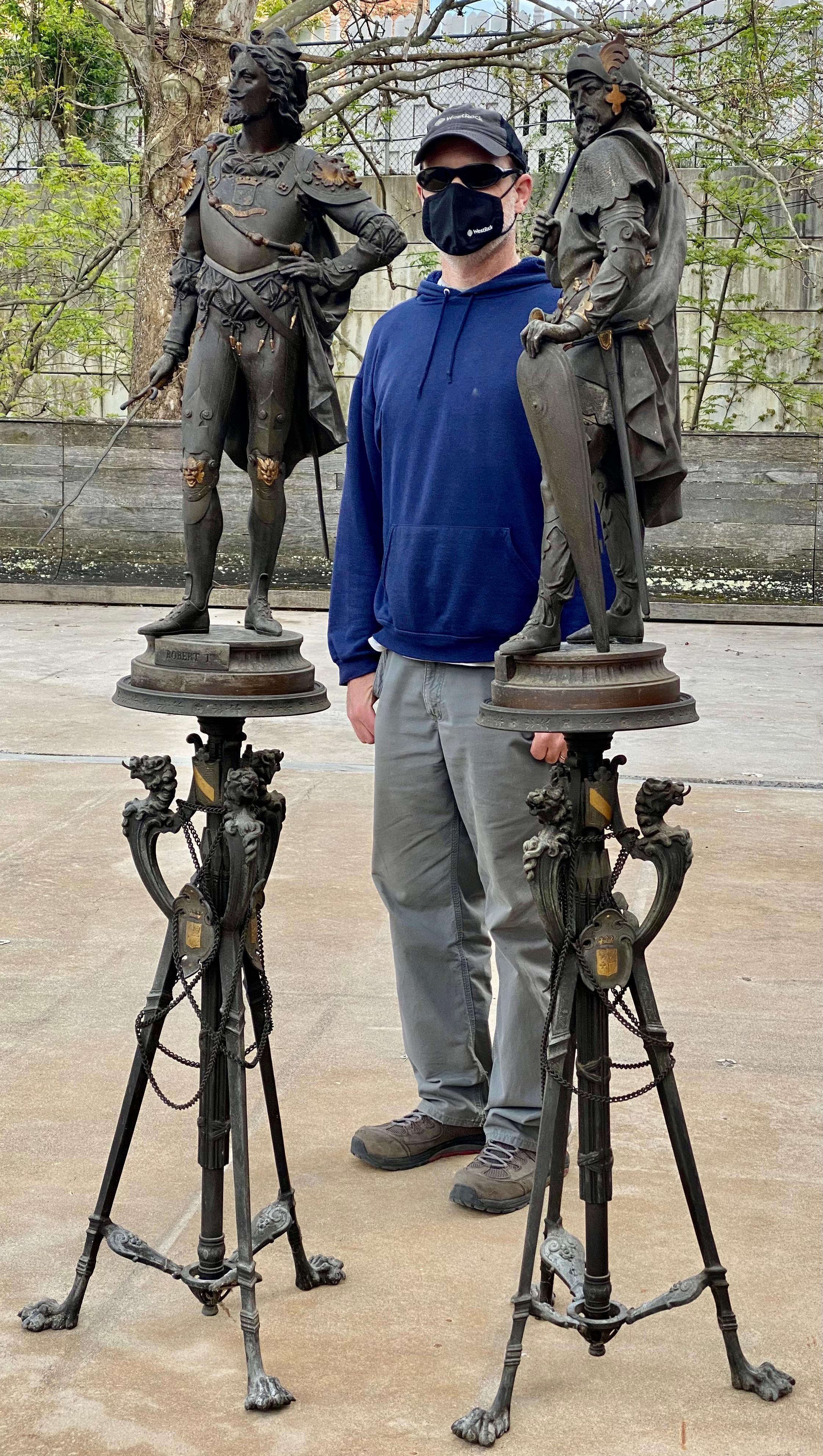This is an amazing pair of detailed spelter medieval military figures on wonderful bases with dragon heads and paw feet. The figures are titled Roland and Robert 1 and are completely adorned with their costumes and armor. The top of one of the bases