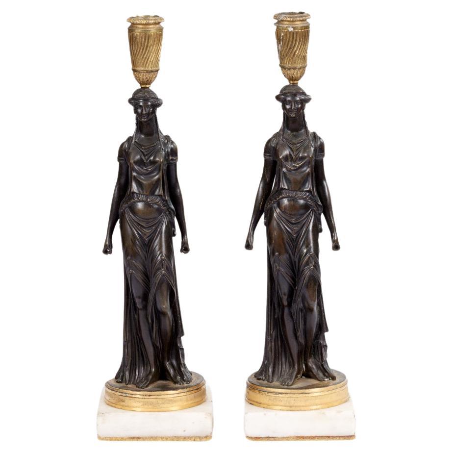 Paar Regency-Kerzenständer aus dem 19. Jahrhundert in der Art von William Kent im Angebot