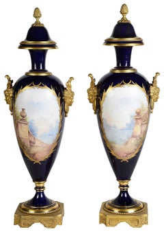 Pair 19th Century Serves style lidded vases.