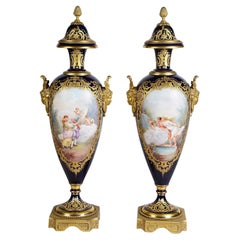 Pair 19th Century Serves style lidded vases.