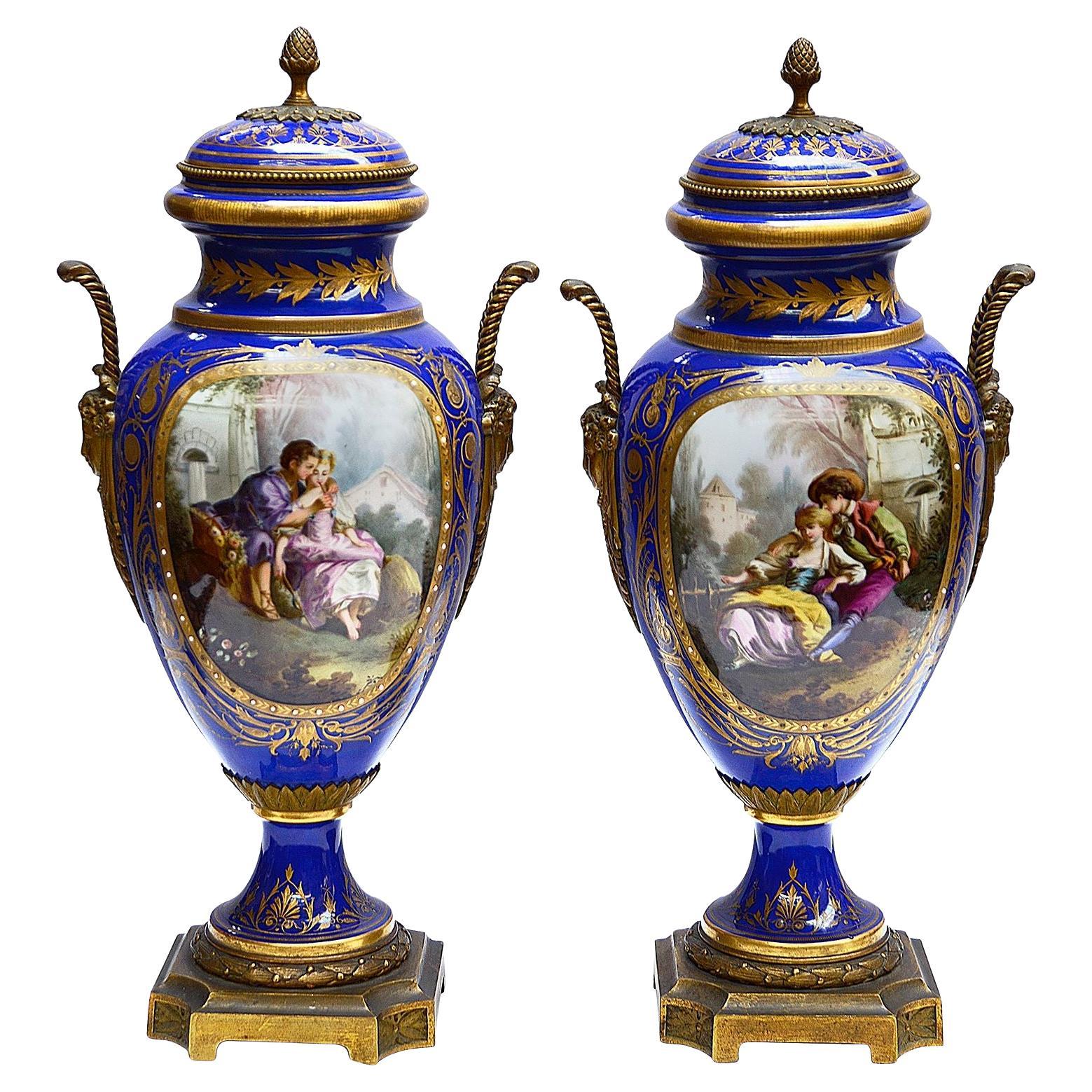 Pair 19th Century Sevres style lidded vases. For Sale