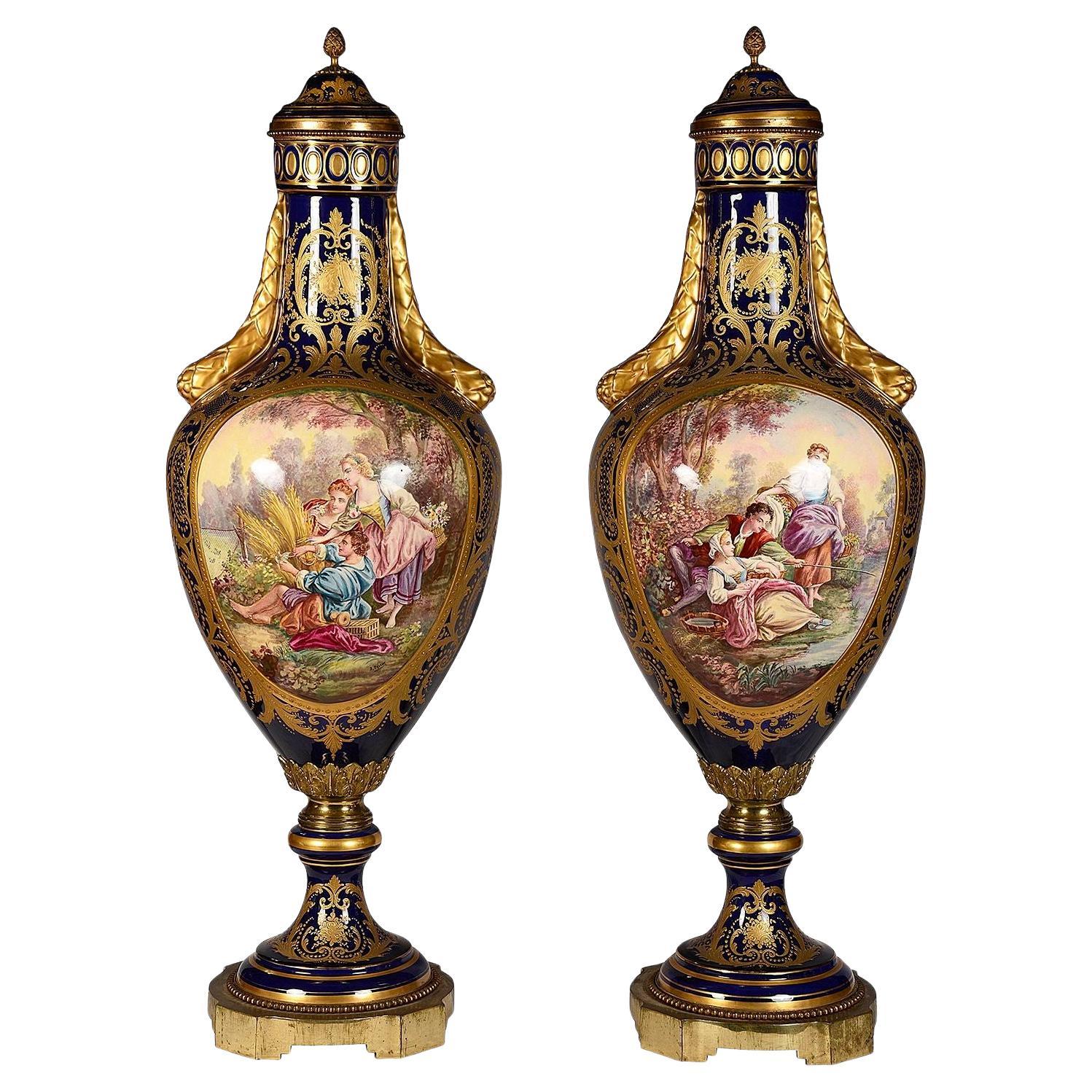 Pair 19th Century Sevres style lidded vases. For Sale