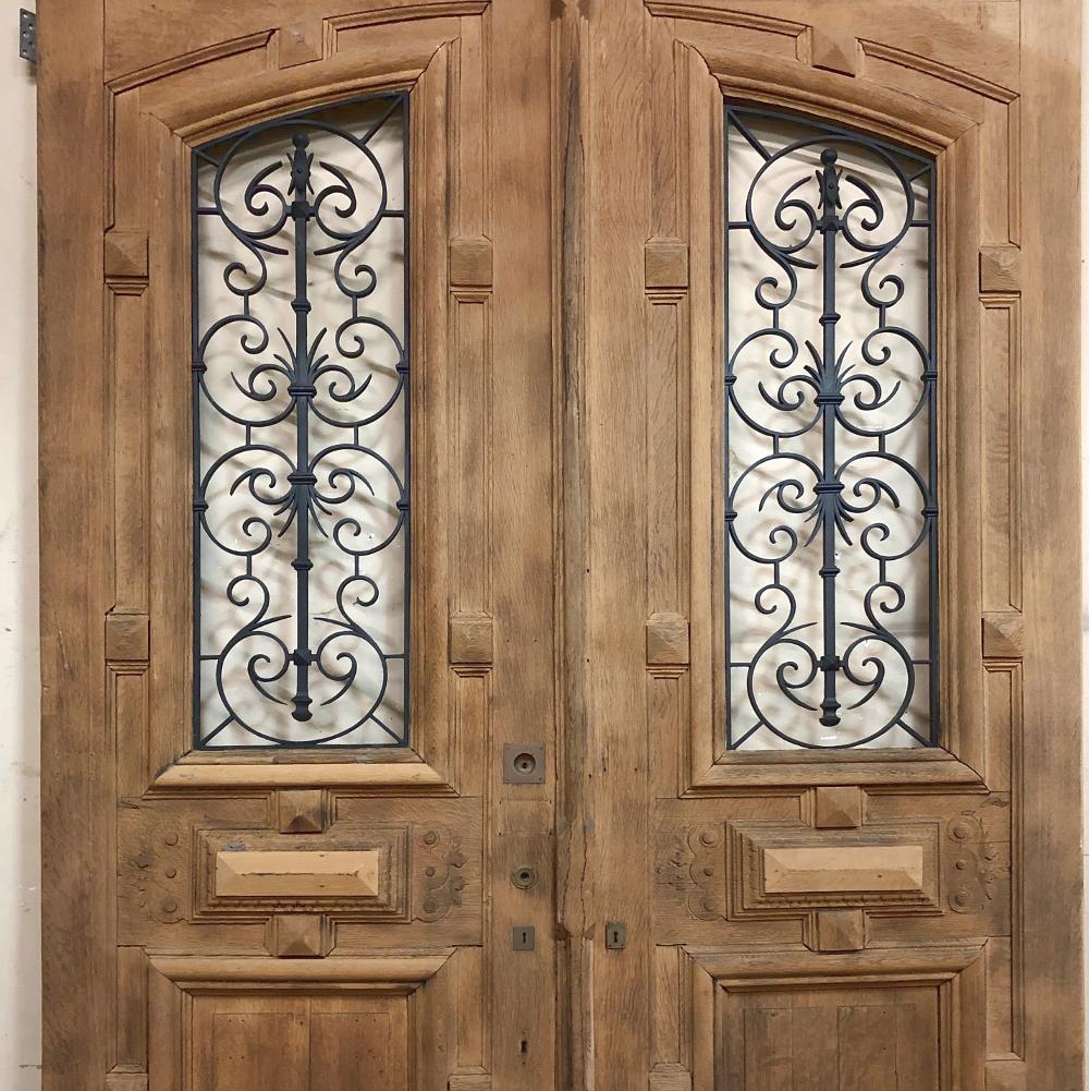 wood doors with wrought iron inserts