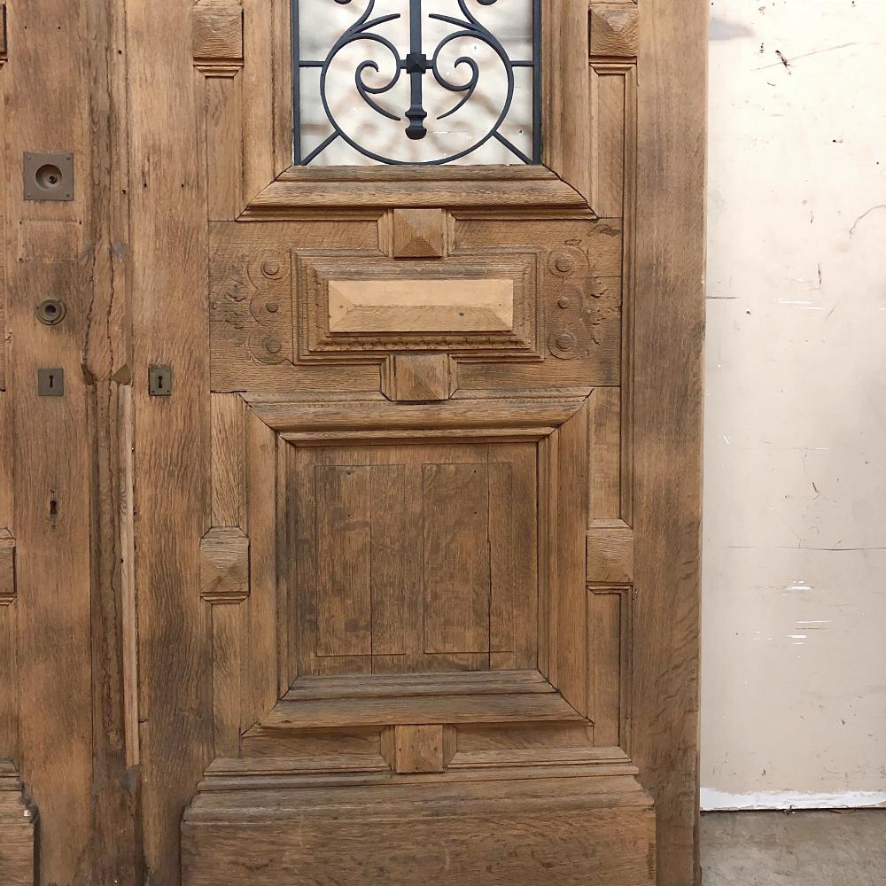 Hand-Crafted Pair of 19th Century Solid Oak Doors with Wrought Iron Inserts