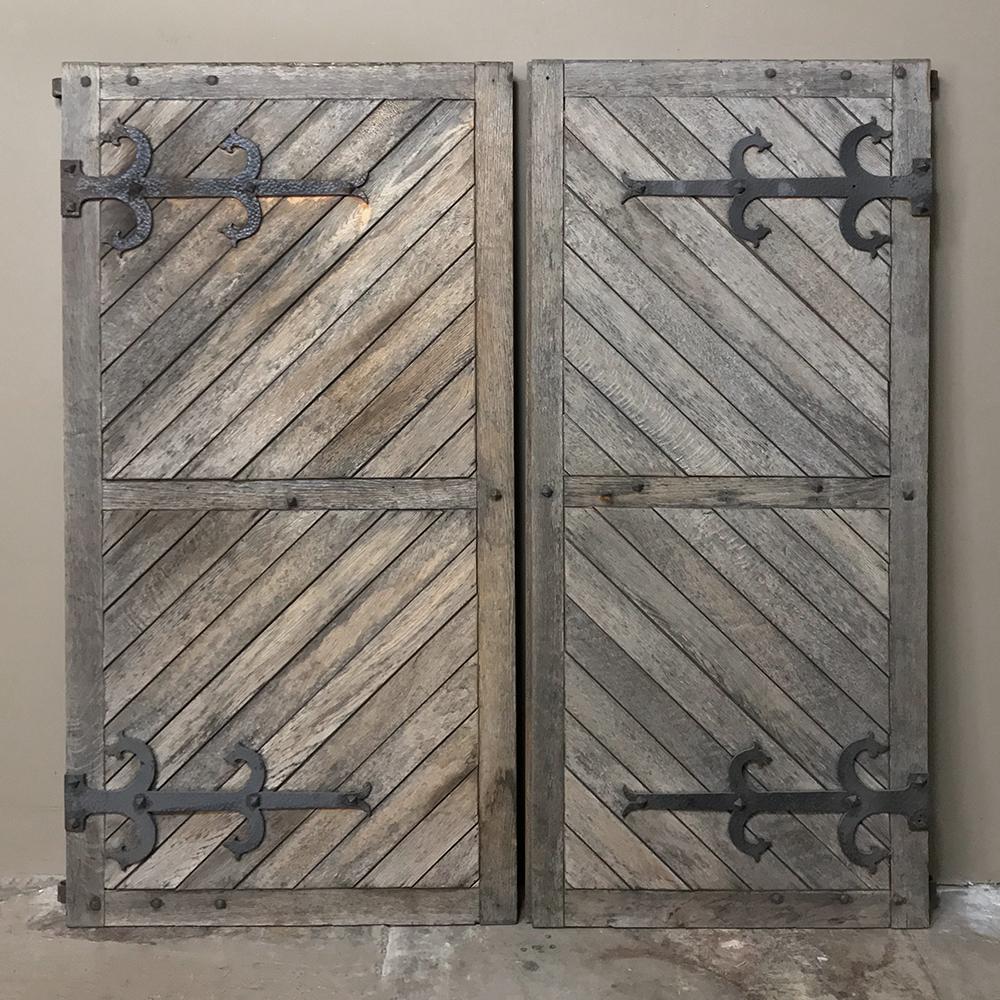 Rustic Pair 19th Century Solid Oak Shutters with Forged Iron Hinges For Sale