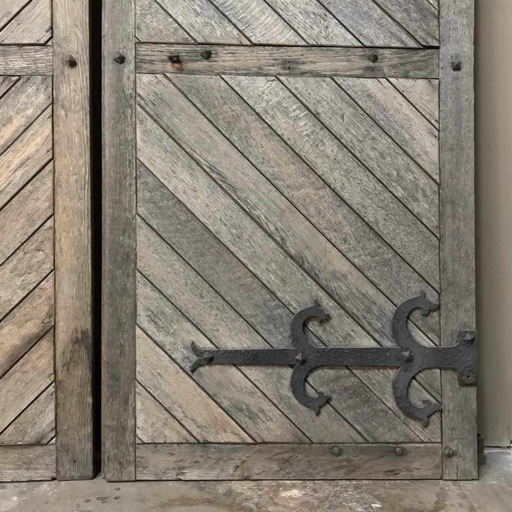 Pair 19th Century Solid Oak Shutters with Forged Iron Hinges In Good Condition For Sale In Dallas, TX