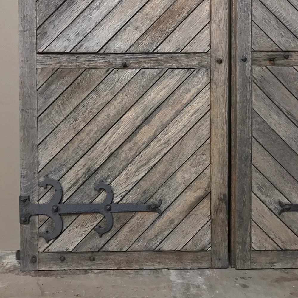Wrought Iron Pair 19th Century Solid Oak Shutters with Forged Iron Hinges For Sale