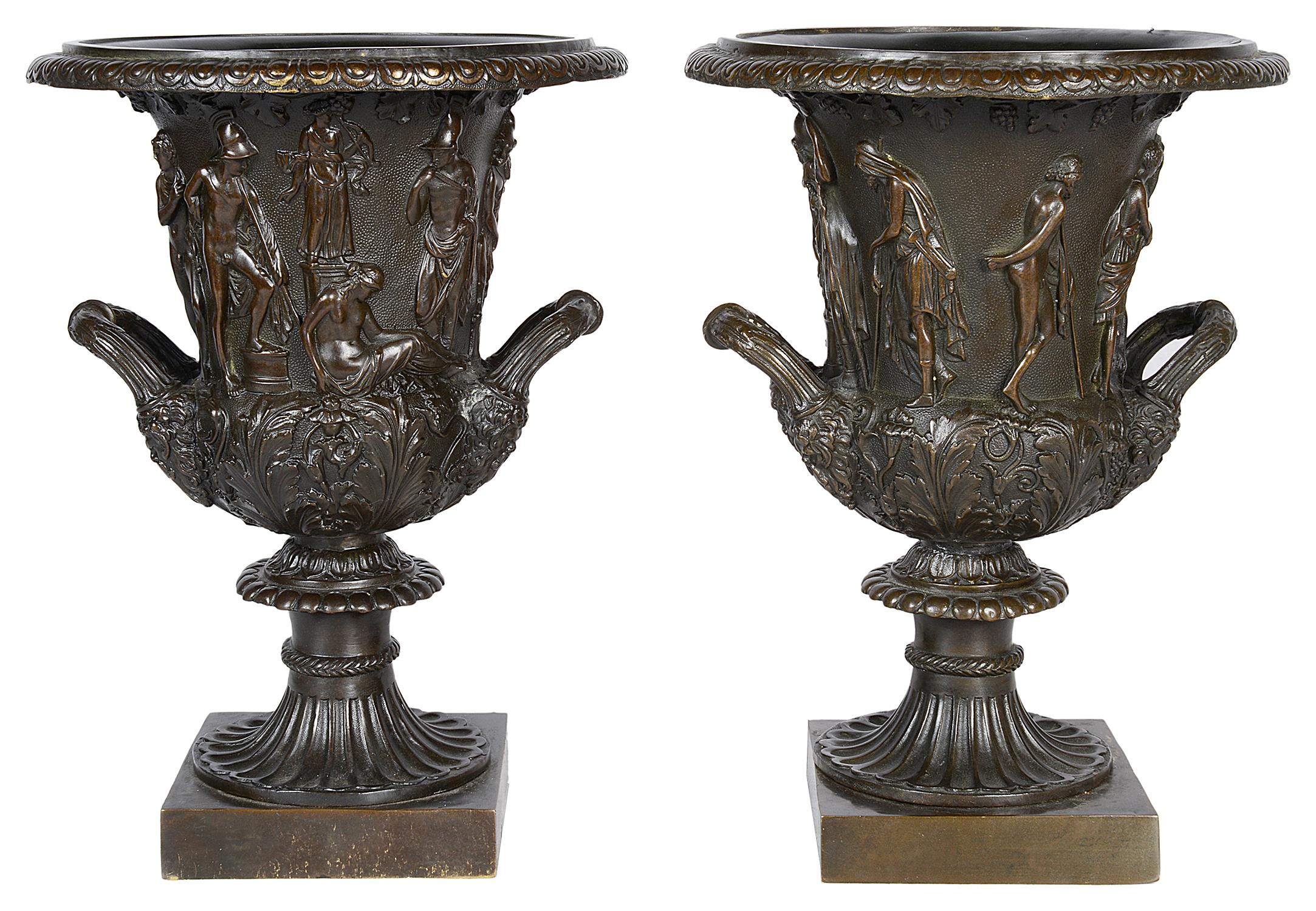 A good quality pair of 19th century style bronze urns after the Medici and Borghese models, with good patination.