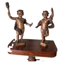 Ein Paar Putti aus Walnussholz aus dem 19. Jahrhundert