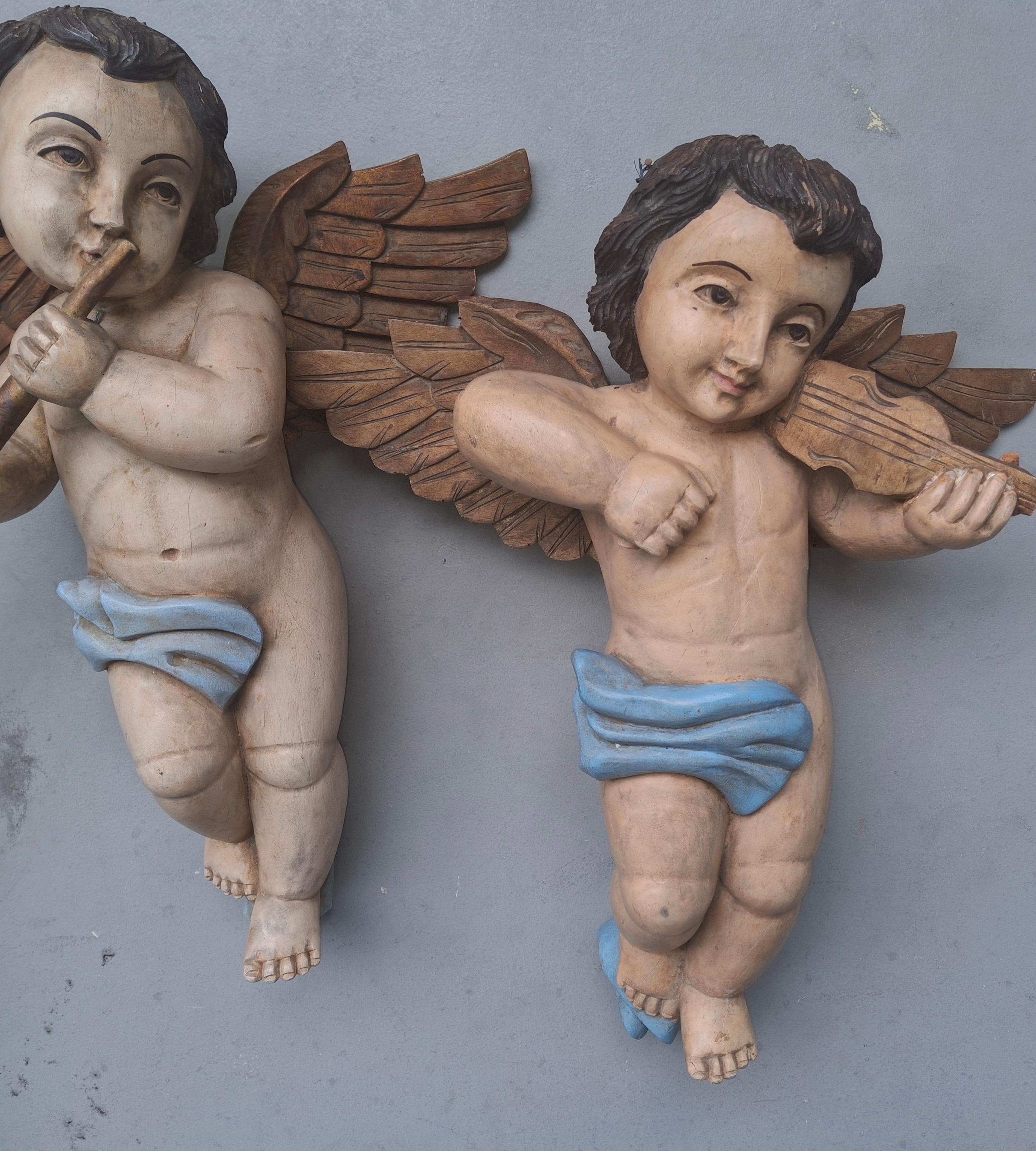Coppia di sculture musicali a forma di cherubino in legno policromo del XIX secolo italiano in vendita 1