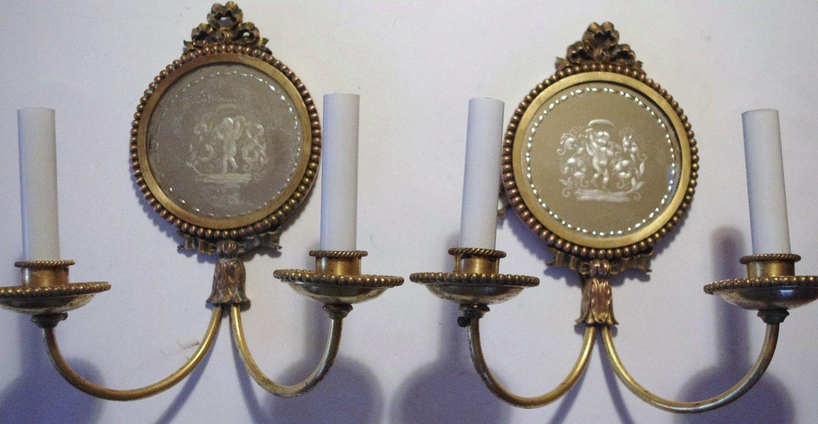 Pair 19thc Neoclassic Bronzw/Eglomise Cherubs Cavorting Wall Sconces by Caldwell In Good Condition For Sale In Opa Locka, FL