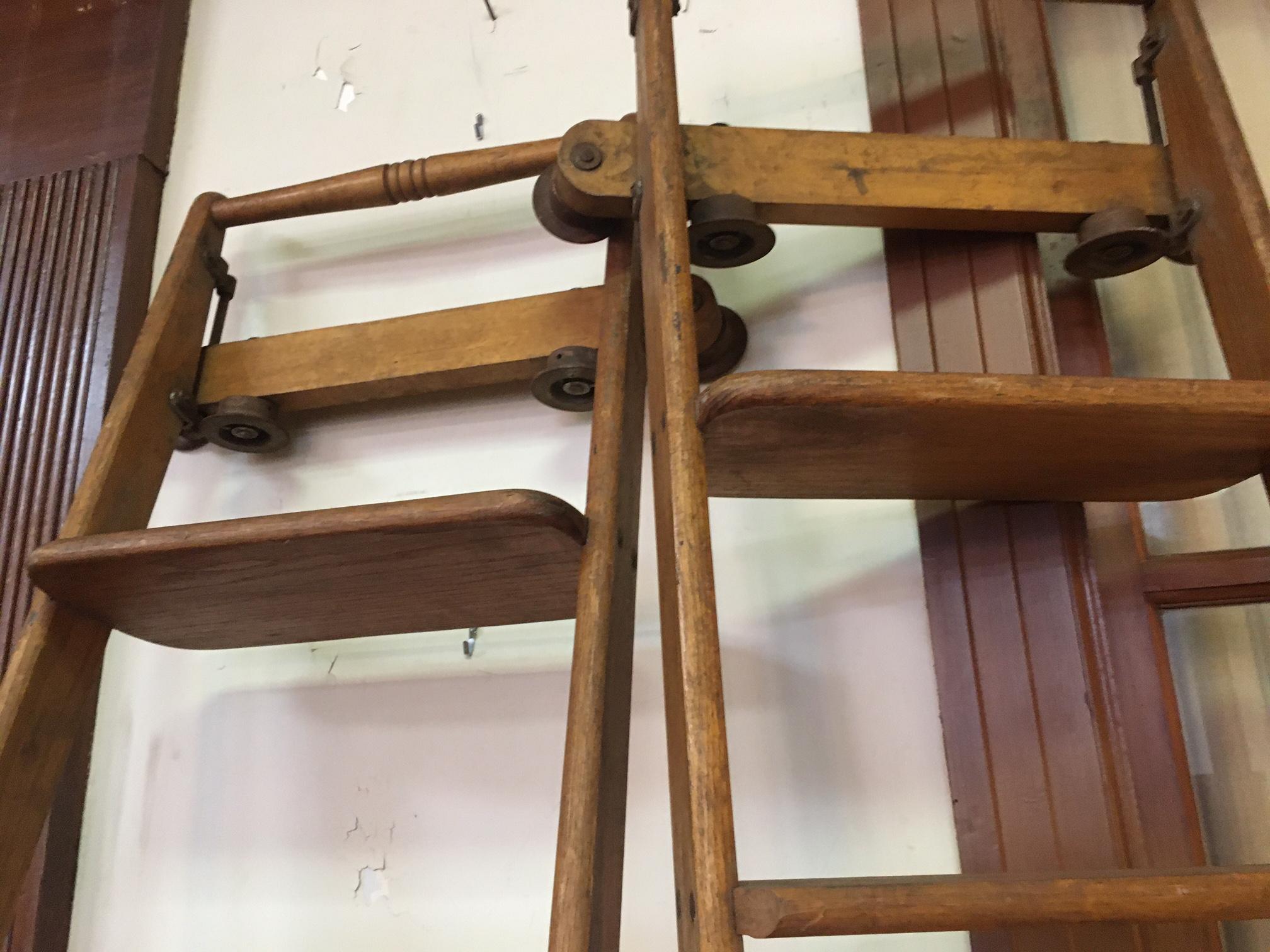 Pair 19thc Tall Haberdashery Tall Rolling Industrial Solid Oak Ladders For Sale 4