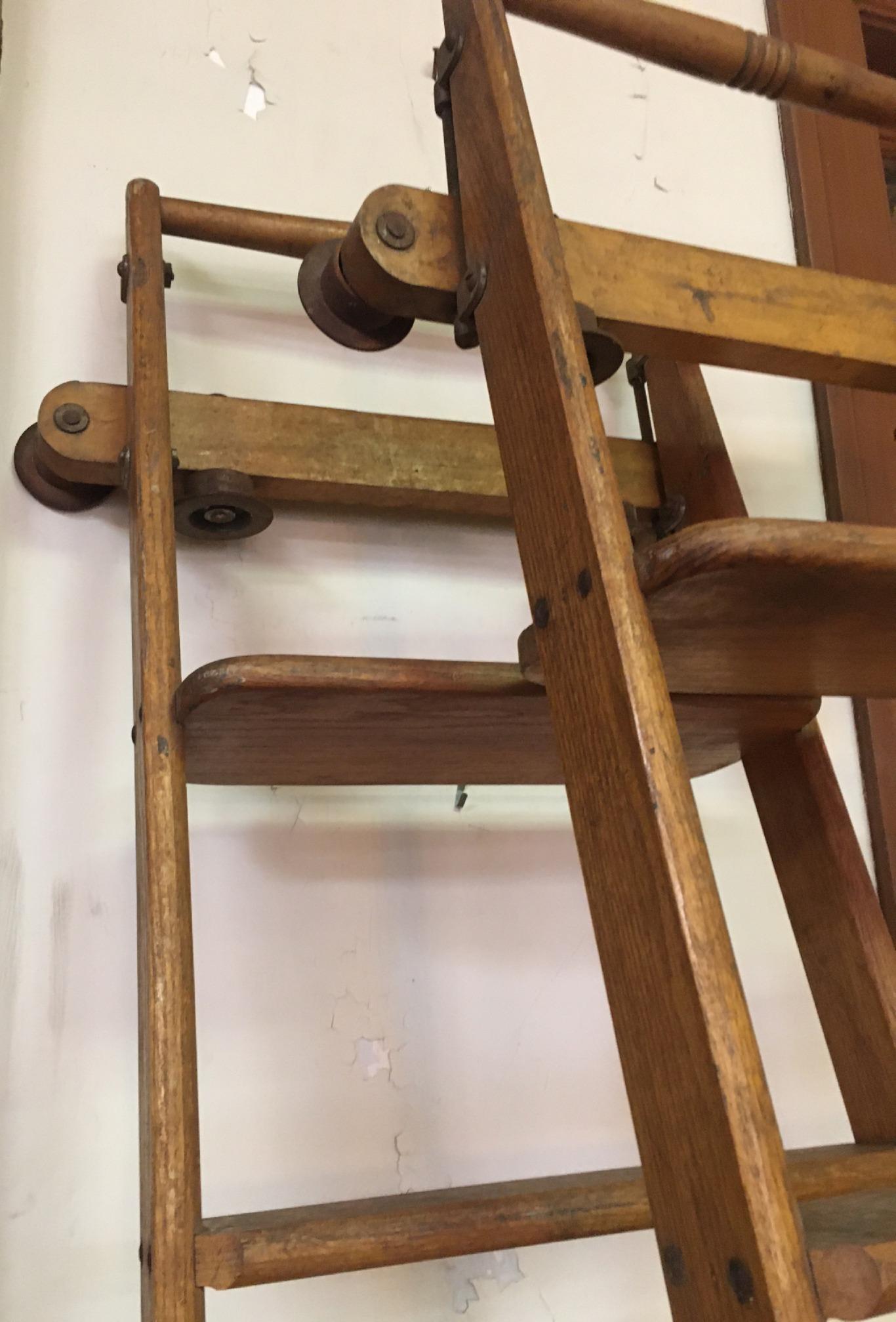American Pair 19thc Tall Haberdashery Tall Rolling Industrial Solid Oak Ladders For Sale