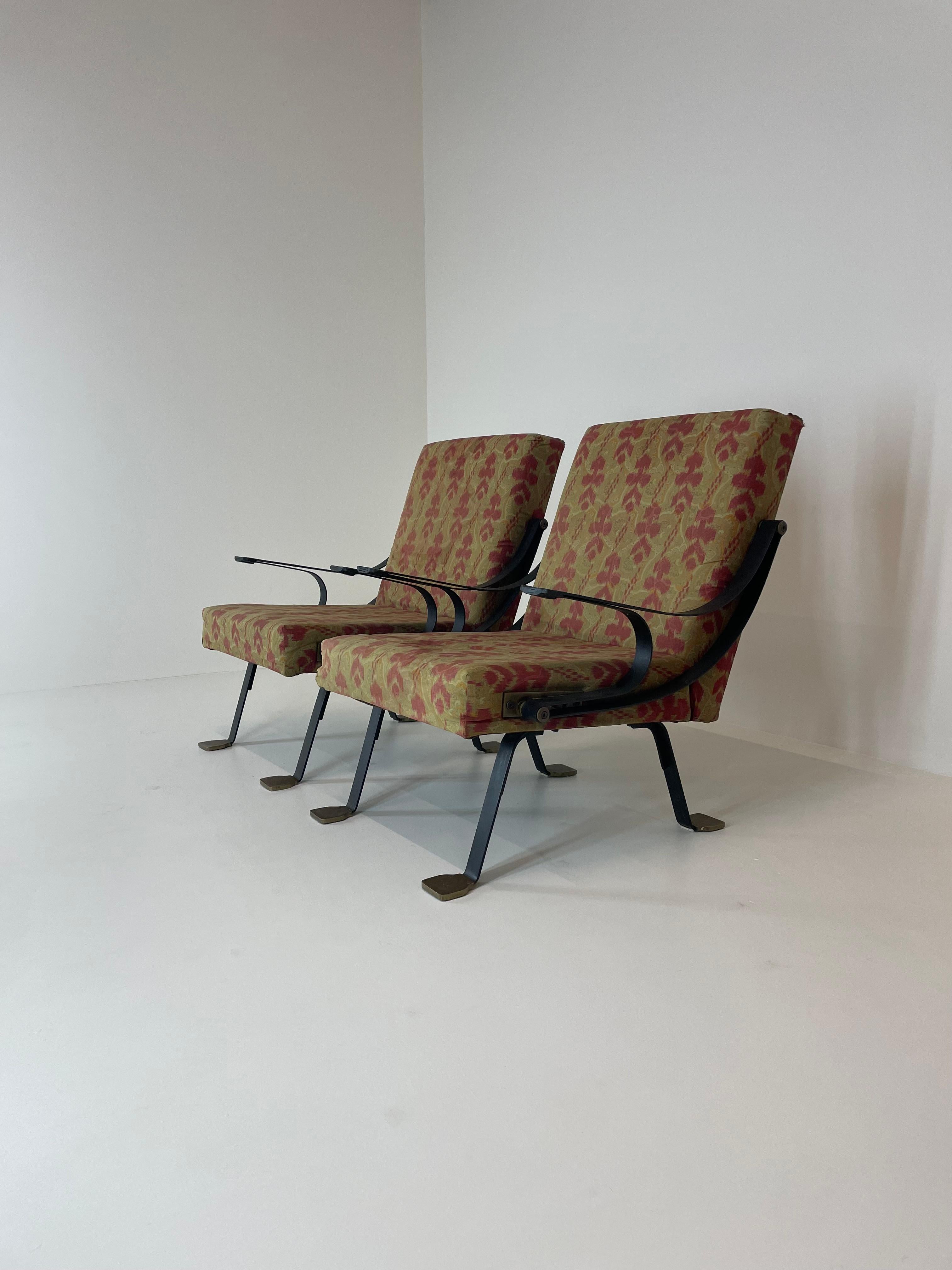An extremely rare first edition pair of original 1950's Digamma reclining chairs designed by Ignazio Gardella designed in 1957 and manufactured by Gavina, Bologna, Italy. 
Original upholstery of the period that can be replaced at your