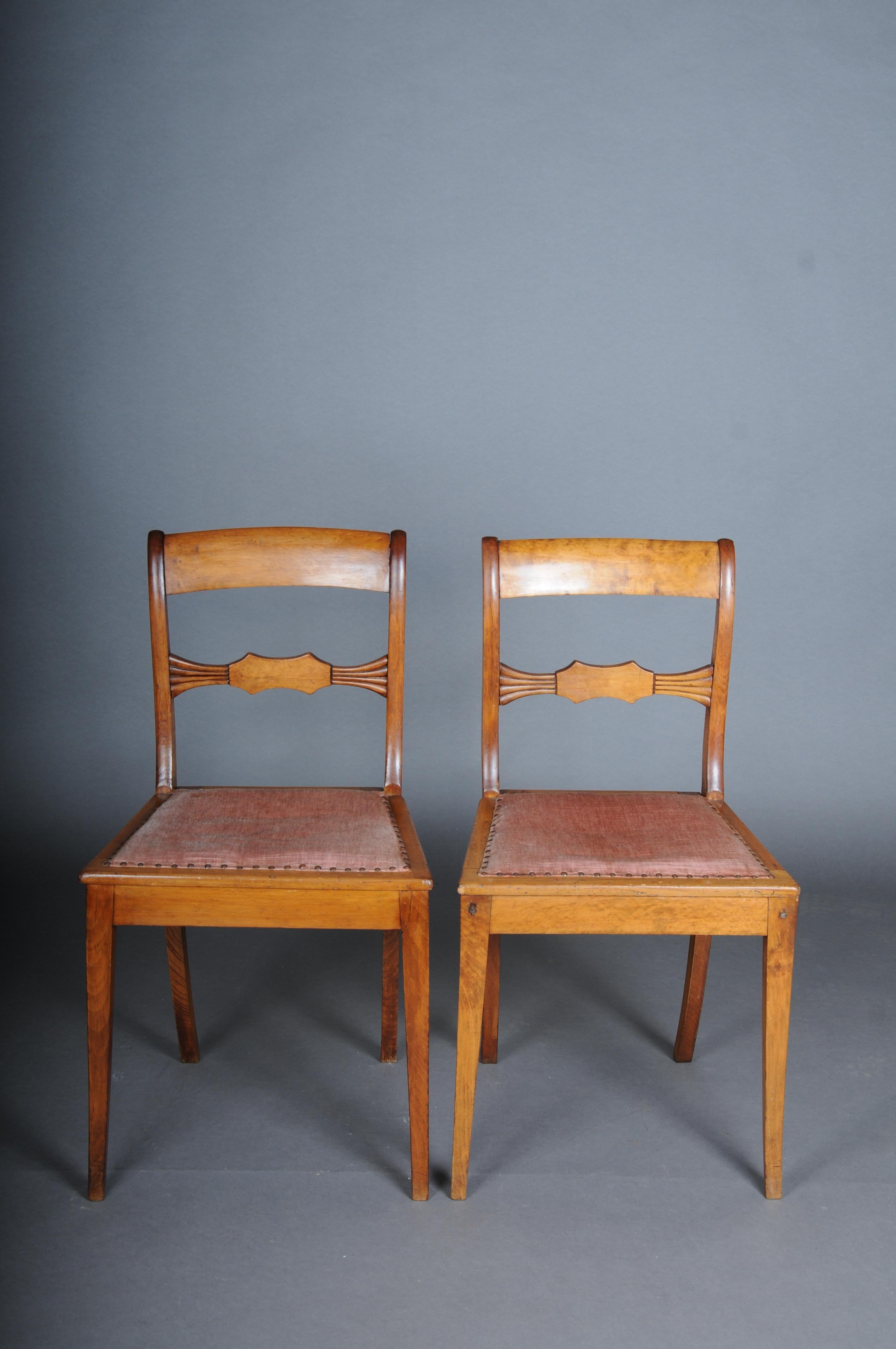 Pair (2) antique Biedermeier chairs circa 1840, birch

Solid birch wood body. Seat cushion upholstered and covered with fabric. Grand-line frame and legs. Slightly curved backrest with partly grooved carving.
Germany, Biedermeier around 1840