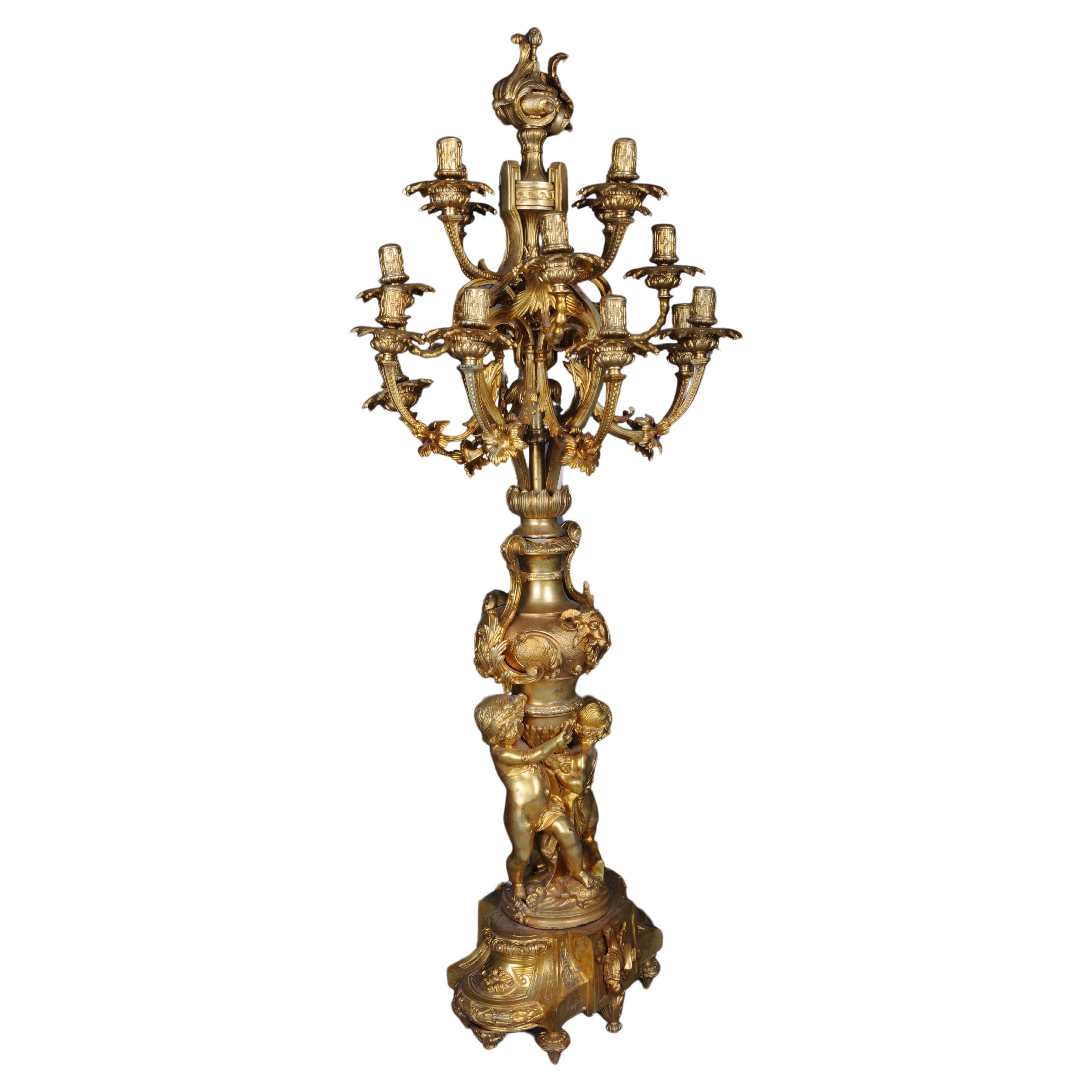 Pair (2) monumental royal candlesticks, gilded bronze, Louis XVI


Solidly made and gold plated. Richly decorated with two puttos. High, magnificent crown with 16 candle nozzles each.
Very decorative and ornate candlesticks.