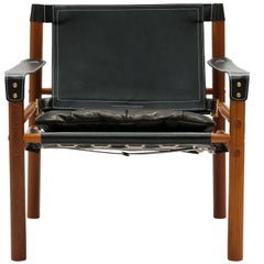 Pair '2' of Black Leather Arne Norell 'Sirocco' Easy Chairs with Brass Buckles