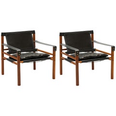 Pair '2' of Black Leather Arne Norell 'Sirocco' Easy Chairs with Brass Buckles