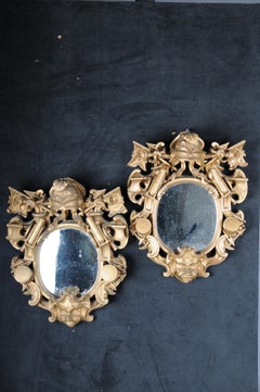 Pair (2) patriotic military wall mirrors in Baroque style, gilded. 20th Century