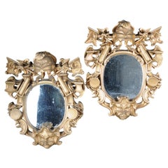 Pair (2) patriotic military wall mirrors in Baroque style, gilded. 20th Century