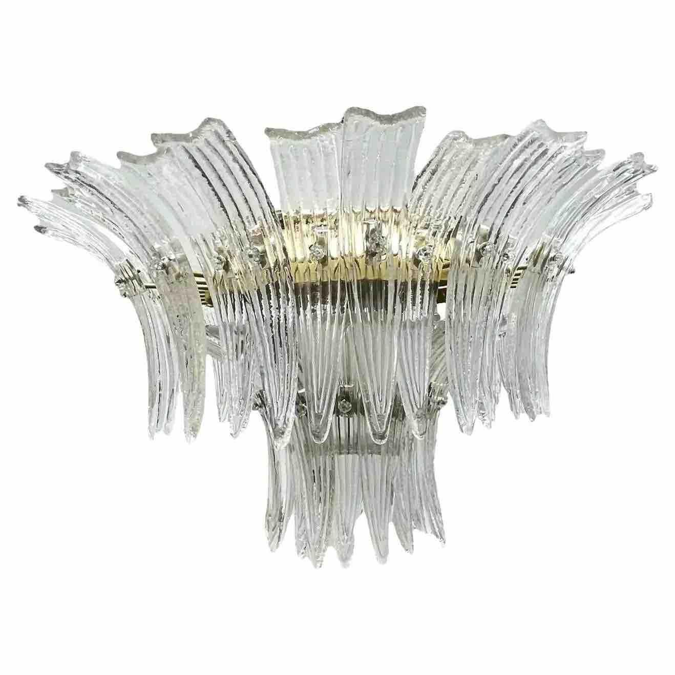 A pair of very elegant, vintage estate, midcentury Venetian Murano art glass chandelier features 2 round tiers of overlapping, large, curved, hand-blown clear palm leaves frosted in the 