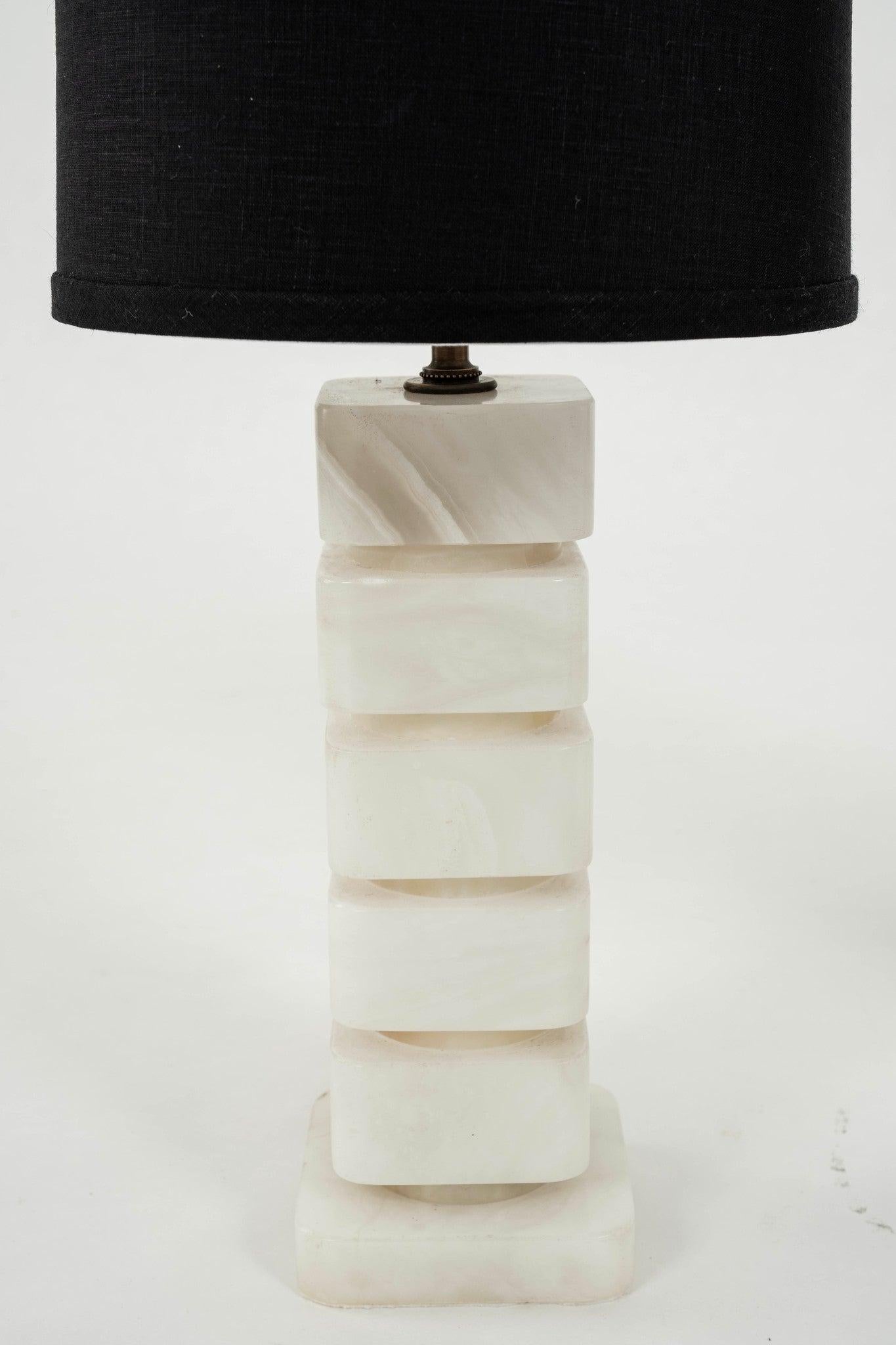 Pair of 1970s Italian Alabaster table lamps newly wired with UL listed parts and black shades.