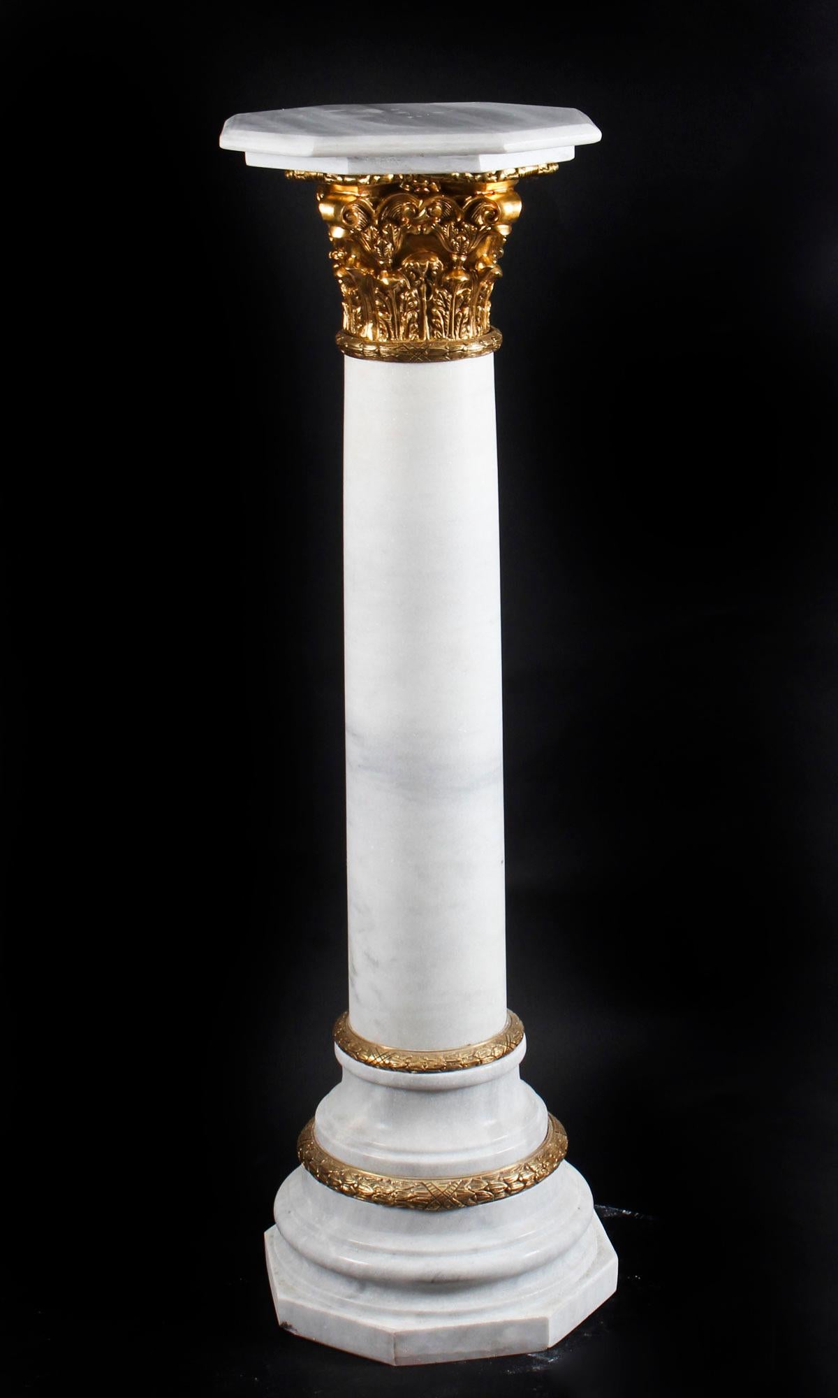 white and gold pedestals