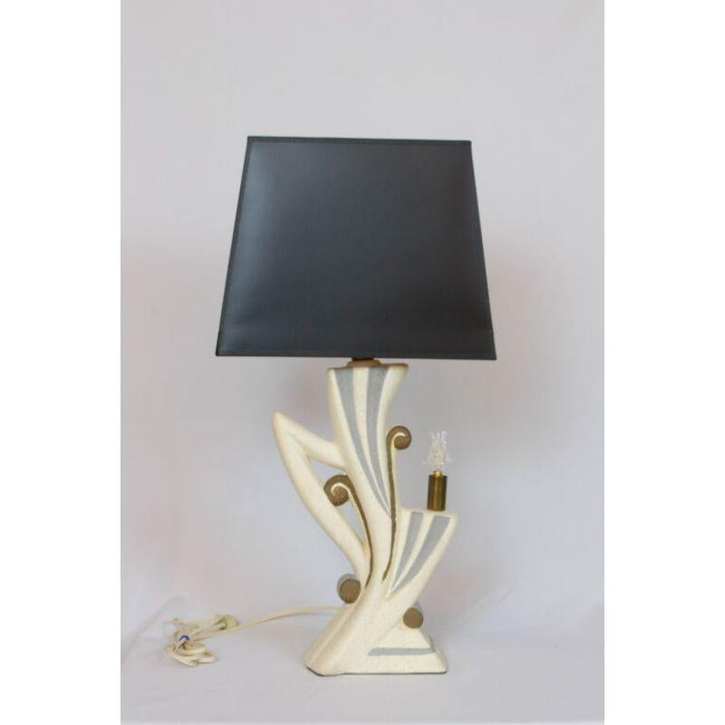 Pair 50’s plaster lamps. Gold and silver painted swirls on a flecked background. Main bulb with shade, extra bulb can be used to really set the mood with or without the main light on. Shades sold separately. Retro-futuristic design with gold and