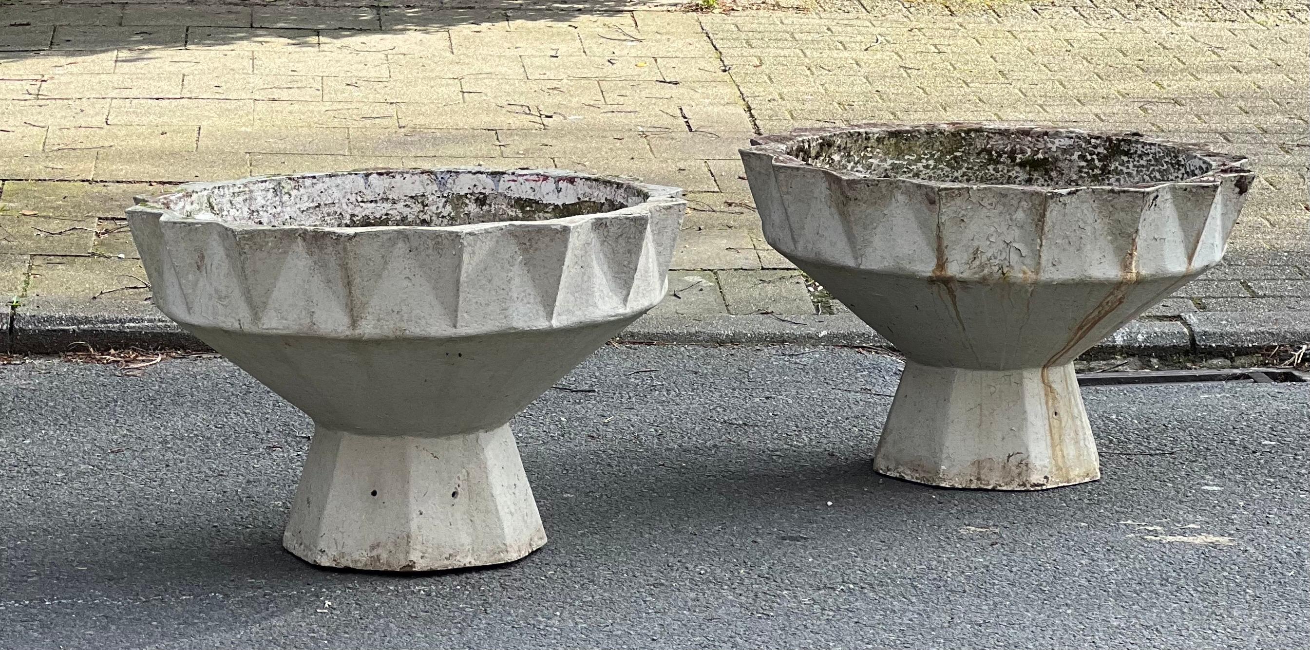 This is a pair of planters created like a sculpture! made out of fiber concrete in the 1950's in Switzerland. It is the second size from that series. We have two of that model and measurements. More models in smaller or bigger scales