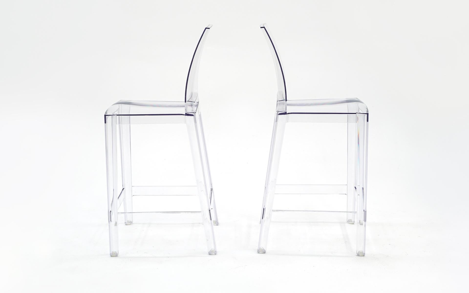 Clear acrylic barstools with backs designed by Philippe Starck and manufactured by Kartel. In unused condition. Like new.