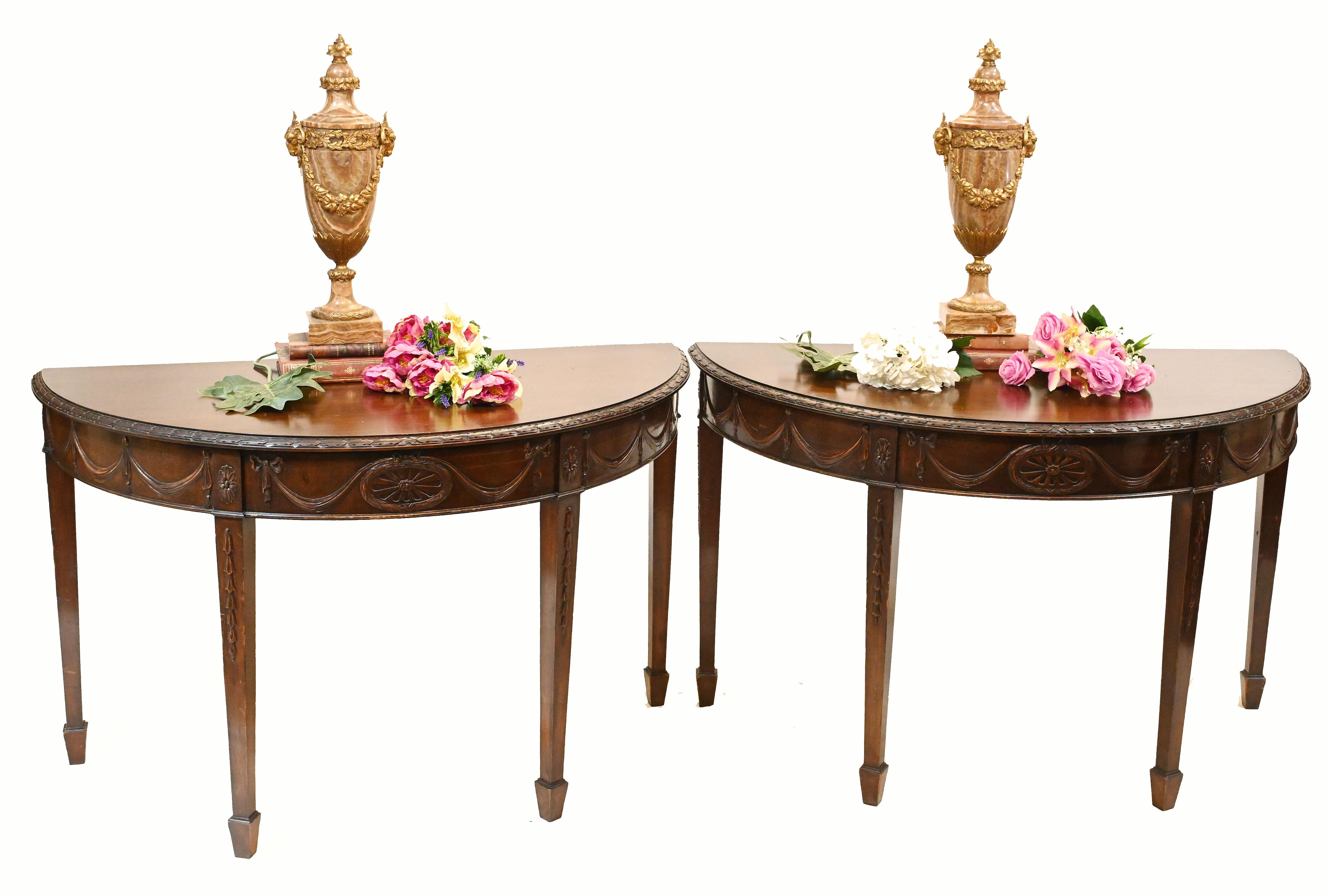 Elegant pair of antique console tables in the Adams manner
Feature raised carving - festoons, drapes - and we date these to circa 1880
Clean and minimal design, great for modern interiors
Great patina to the mahogany
Viewing by