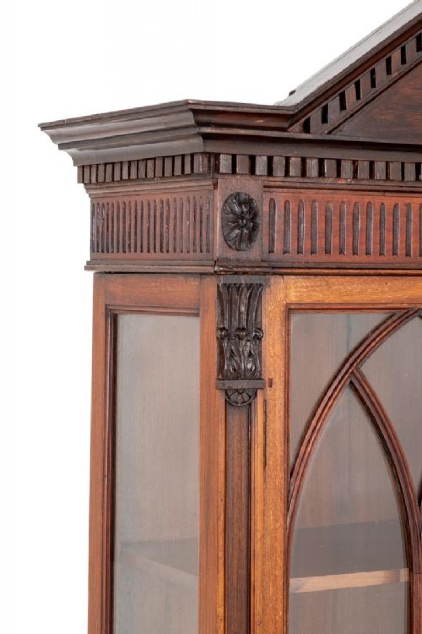 Matched Pair of Mahogany Adams Style display cabinets.
These Rater Attractive Cabinets are of Diminutive Form.
circa 1900
Raised upon Shaped Legs with Ebony Line Inlays.
The Shaped Frieze of the Cabinets Having Fluted Detail, Carved Swags and