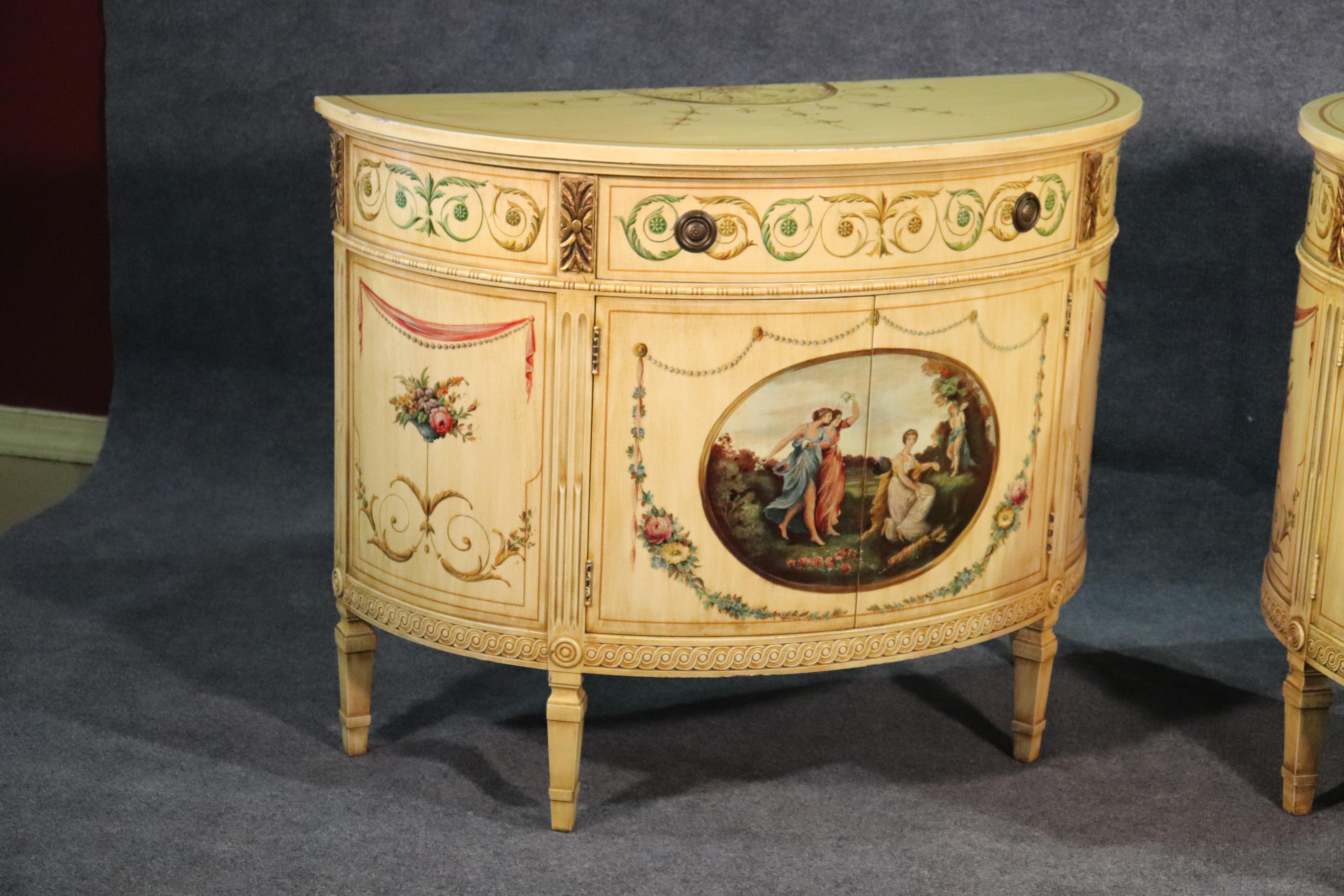 This is a rare matched pair of Adams paint decorated commodes, circa 1930. The commodes 