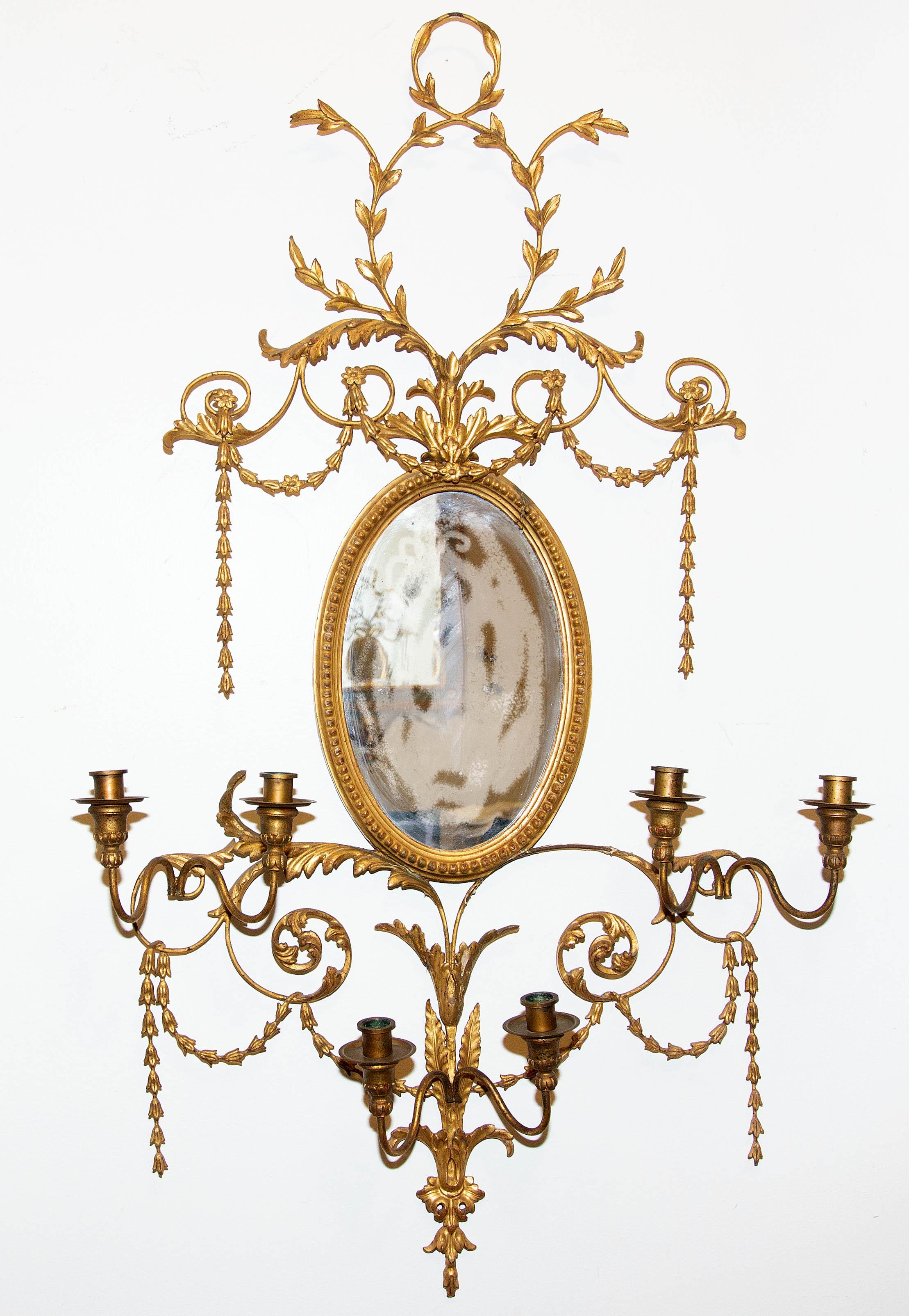 Pair of Adams style gilt mirrors with sconces. Fine quality gilt wall sconces with 6 candle holders. Giltwood and gesso, 19th century.