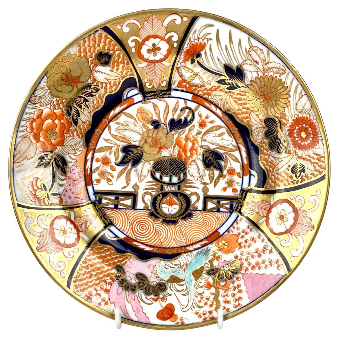 Why we love it: The intensity of the Imari colors and the fabulous pink spotted lion.
This pair of Coalport Admiral Nelson dishes was hand-painted in England during the Regency period circa 1810. It is decorated in a traditional, vibrant Imari