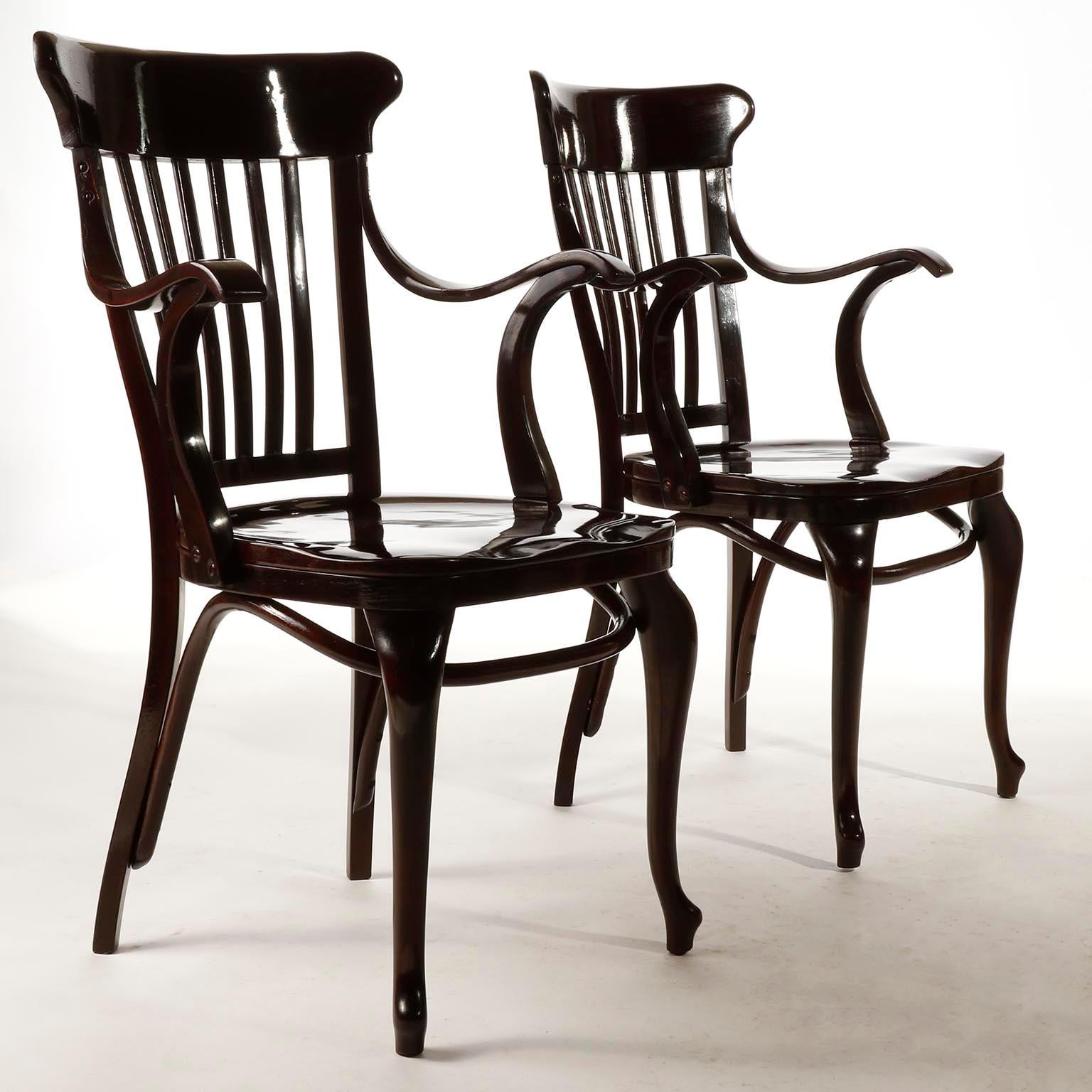 A pair of fantastic and extremely rare Adolf Loos armchairs manufactured by Thonet.
Adolf Loos adopted this chair model inspired by 18th century Windsor chairs and used it for the Cafe Capua which interior was designed by him in 1913.
The Cafe Capua