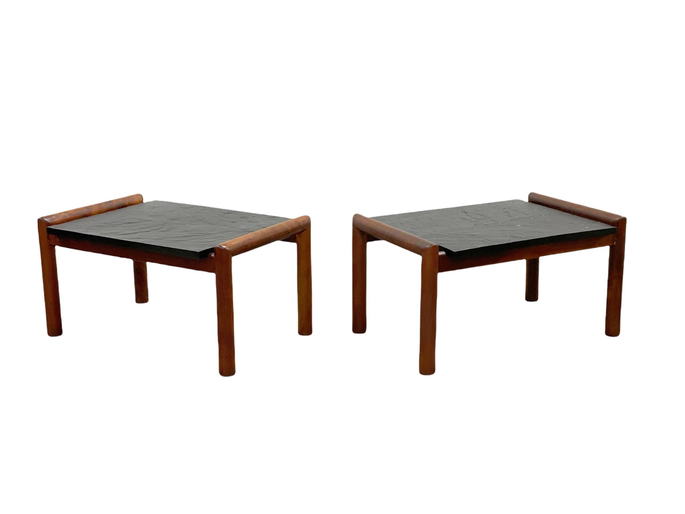 Pair of mid century organic modern end tables by Adrian Pearsall for Craft Associates circa 1965. Featuring solid American black walnut frames with slate tops. Clean refined simple lines and a perfect juxtaposition of materials - these tables lend