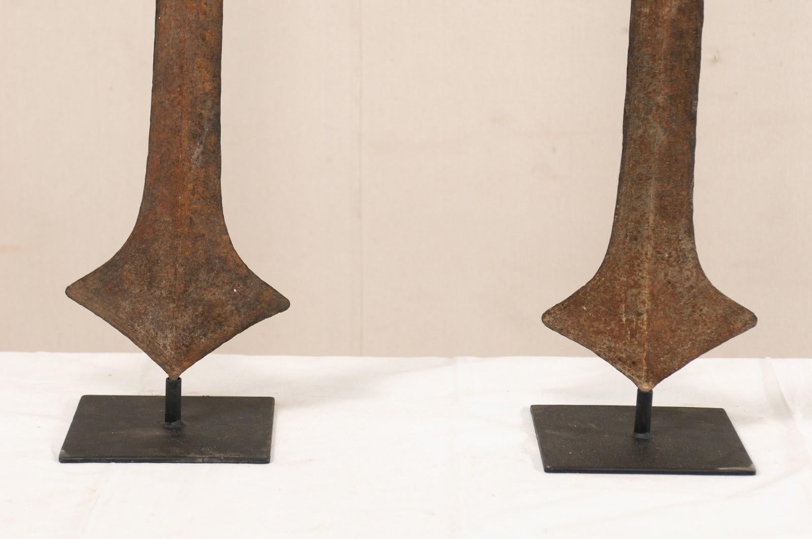 Metal Pair of African Iron Sword Currencies on Custom Stands For Sale