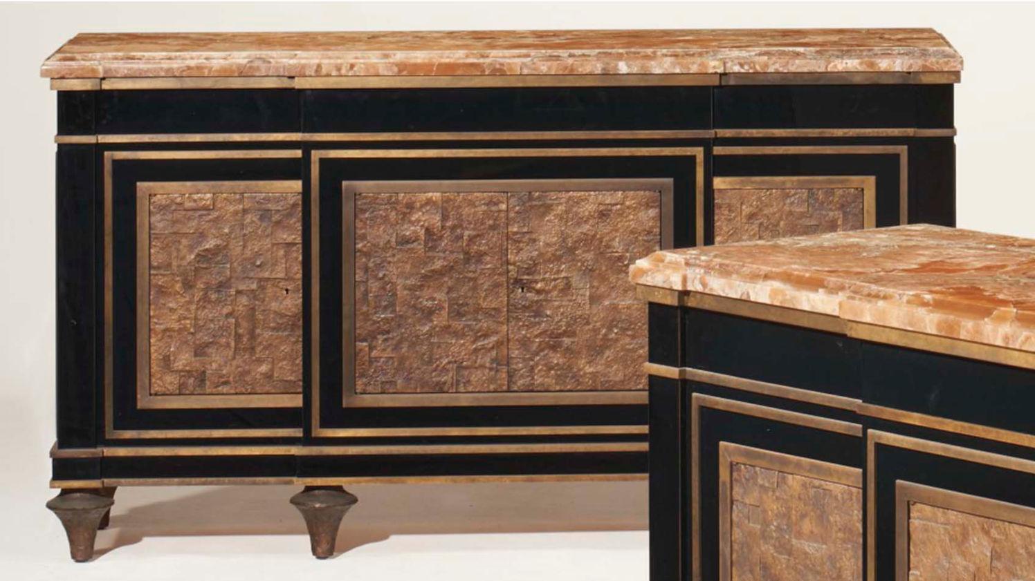 Our extraordinary pair of side cabinets in the Louis XVI style were supplied by Peter Marino for a prestigious Palm Beach client. Each 39 3/8 by 73 by 21 in (100 by 185.4 by 53.3 cm), with black lacquered surfaces, patinated bronze mounts and