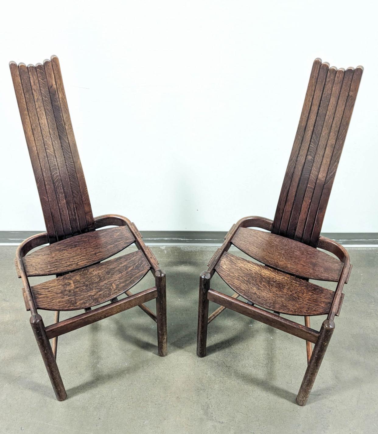 Beautifully designed pair of solid wood, high-back dining chairs made by Allmilmo in the 1980's. Very versatile look that fits with many design styles.