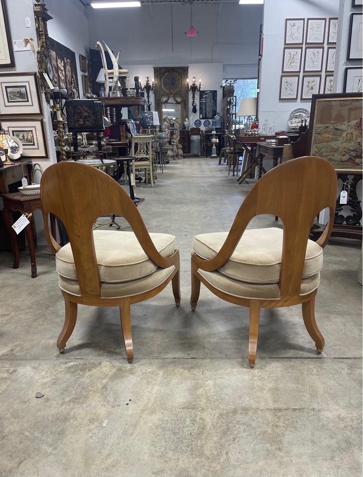 A pair of American (Likely Baker) mid century walnut framed spoon back chairs. After the 19th century Italian chairs - these are exceptional form and condition.