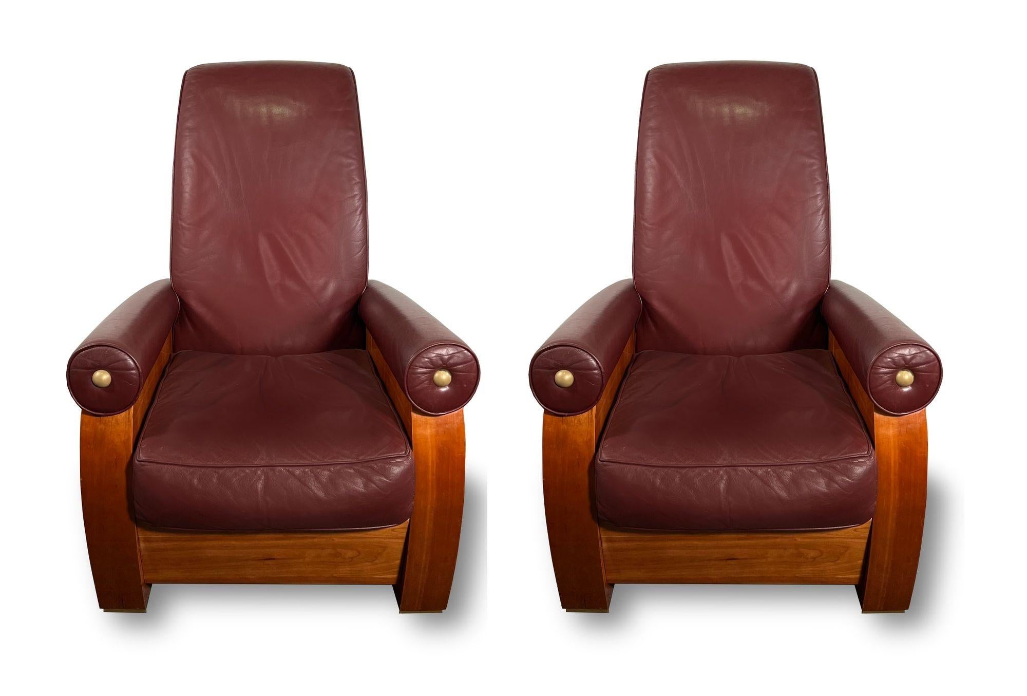 High back with the body in mahogany, the rolled upholstered arm over chunky feet with cut out side profile