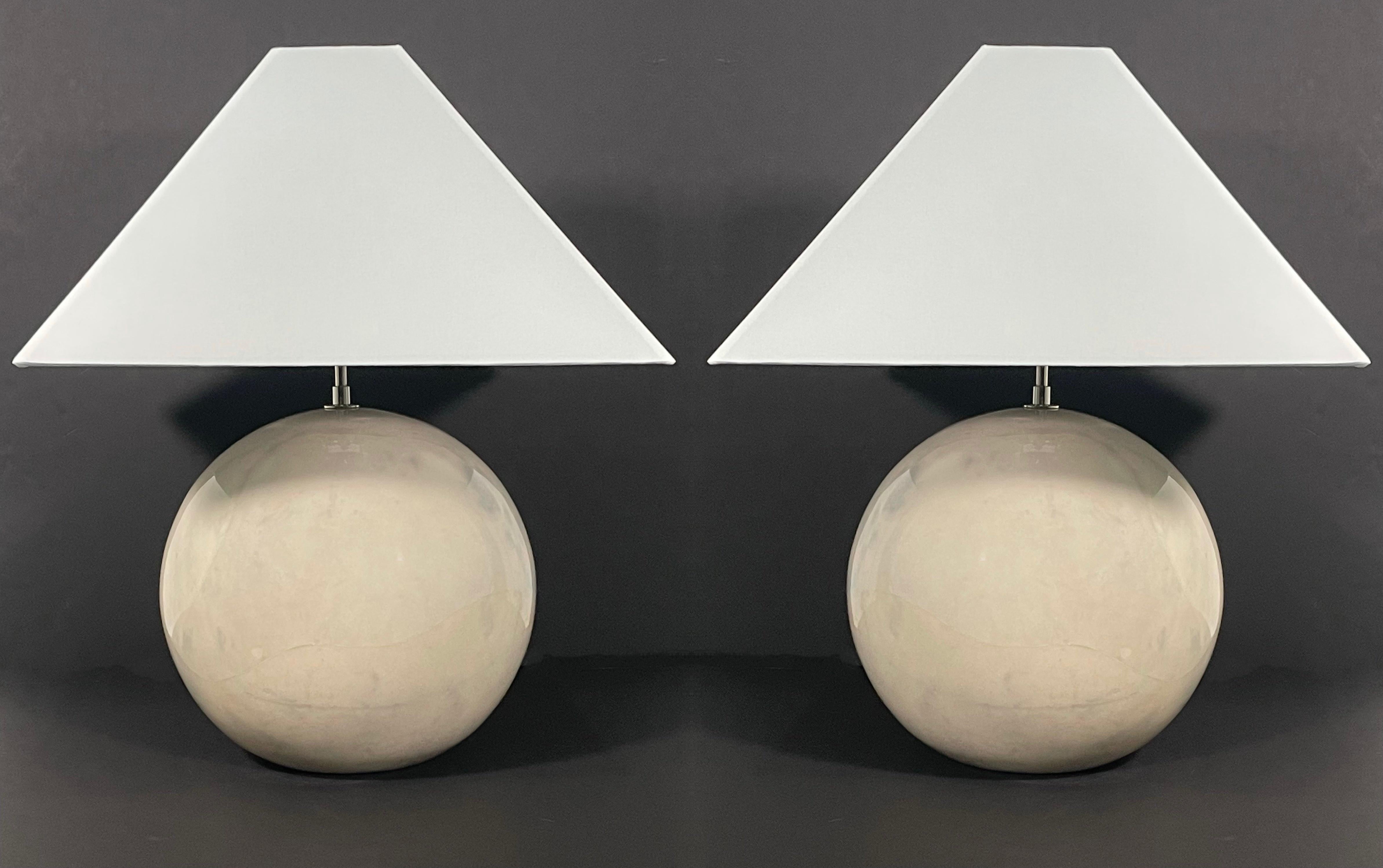 Pair American Modern Lamps produced by Karl Springer LTD. We represent Karl Springer LTD and can order these lamps in a variety of goatskin colors. Shades not included. Note* Overall height dimension include shade shown (not included), and harp,
